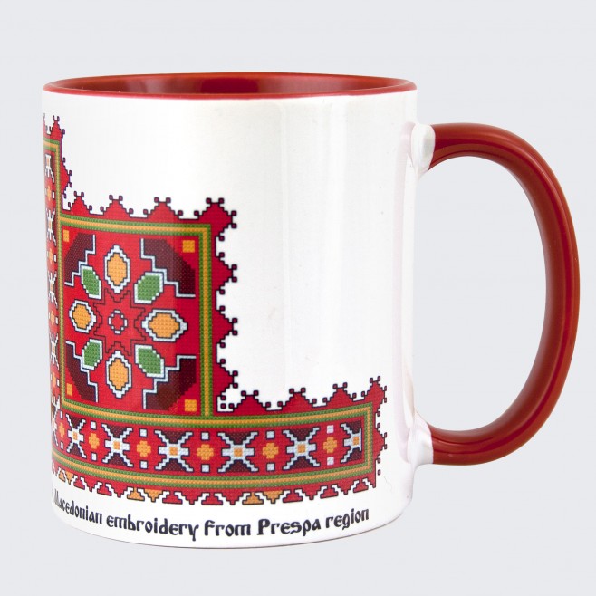A cup decorated with embroidery from a Prespa embroidery