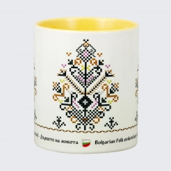 A cup decorated with embroidery from Bulgaria  - The Tree of Life - yellow