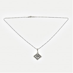 Silver medallion Cook flower