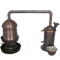 Distiller for brewing brandy, herbs and rose water